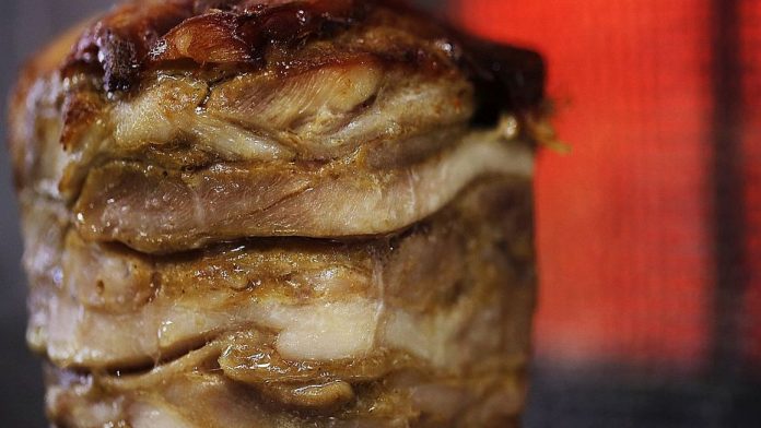 Kebab meat is seen on a spit at a restaurant in Clisson