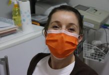 Epidemija je končana, maske v zaprtih javnih prostorih še naprej obvezne