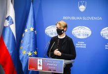V rdečih regijah začenja veljati odlok o obveznem nošenju mask na prostem