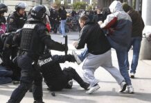 Policija išče razgrajače s torkovega protesta – jih poznate?